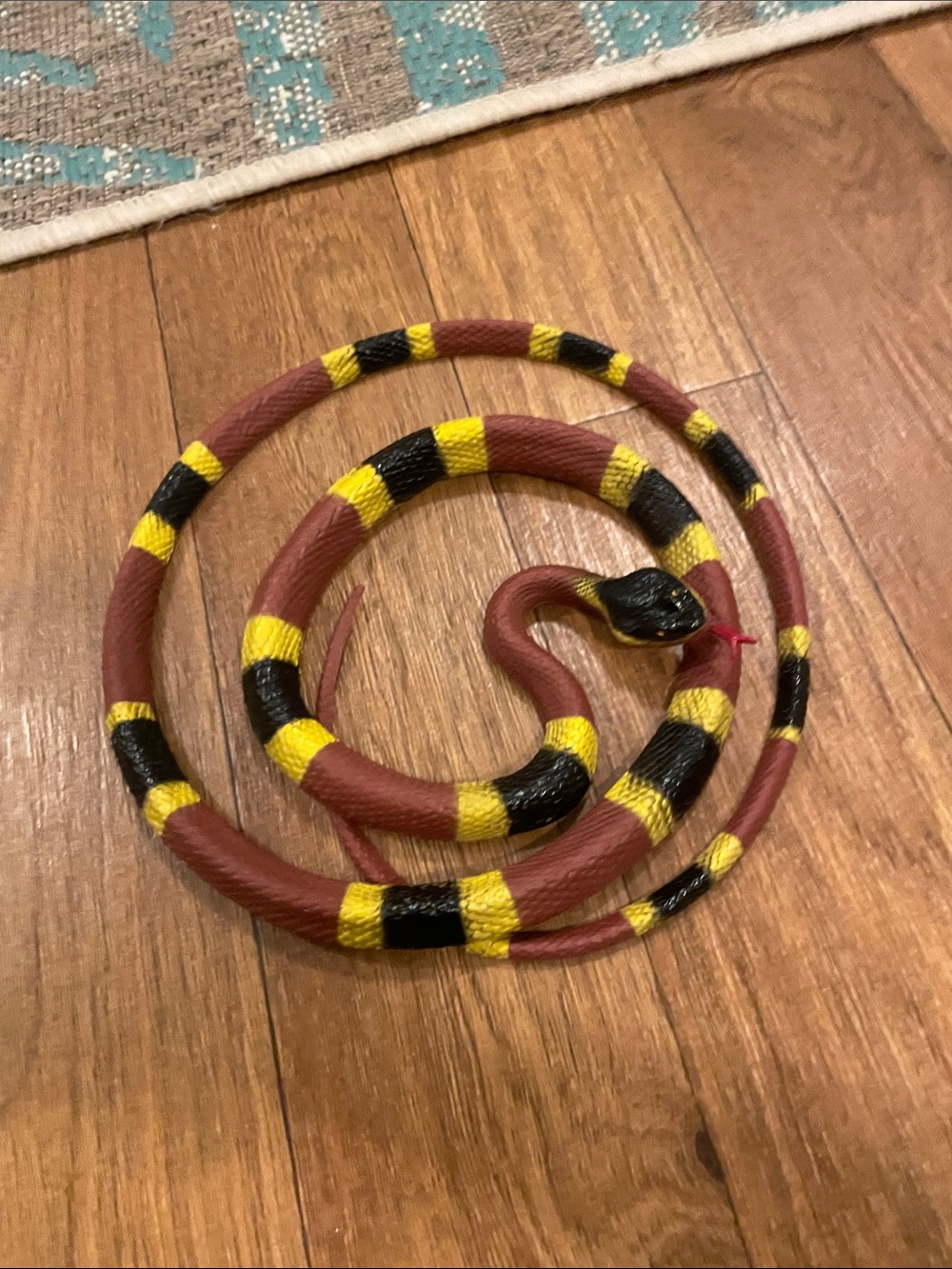 Red, Yellow & Black Rubber Snake Toy for Reptile Enrichment
